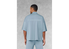 The Giving Movement Super Oversized High Neck Raw Edge T-Shirt - Powder Blue